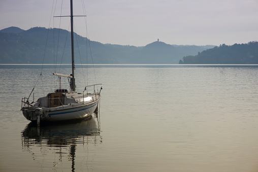 Lake Orta with moored boat and \