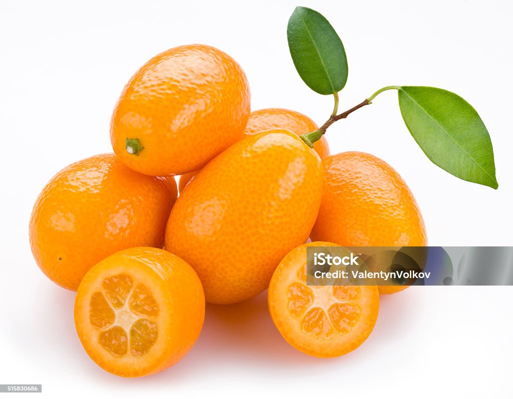 Kumquats Group of kumquat fruits on the white background. Citrus Fruit Stock Photo