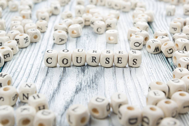 istock Courses word written on wood block. Wooden ABC 515832420