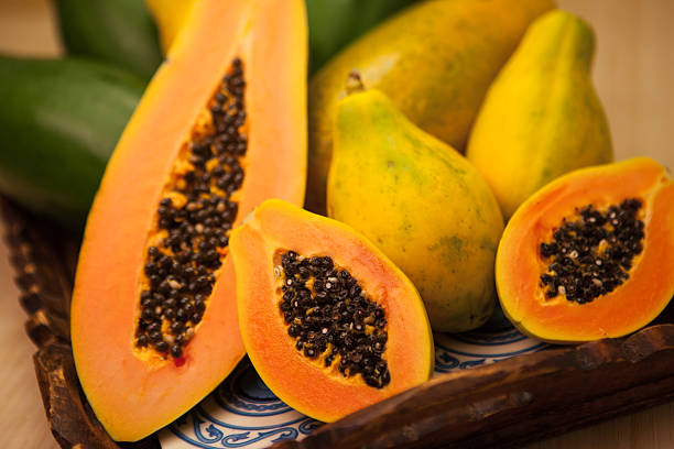 papaya - papaya fruta tropical fotografías e imágenes de stock