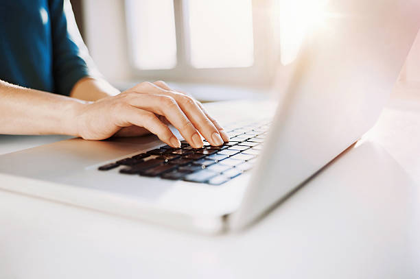 istock Female hand on a laptop keyboard 515836148