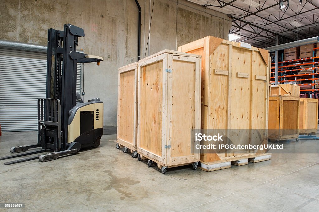 Forklift and wooden containers in manufacturing industry Absence Stock Photo