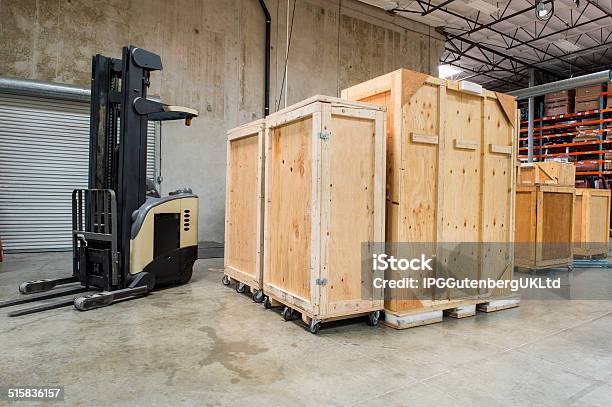 Forklift And Wooden Containers In Manufacturing Industry Stock Photo - Download Image Now