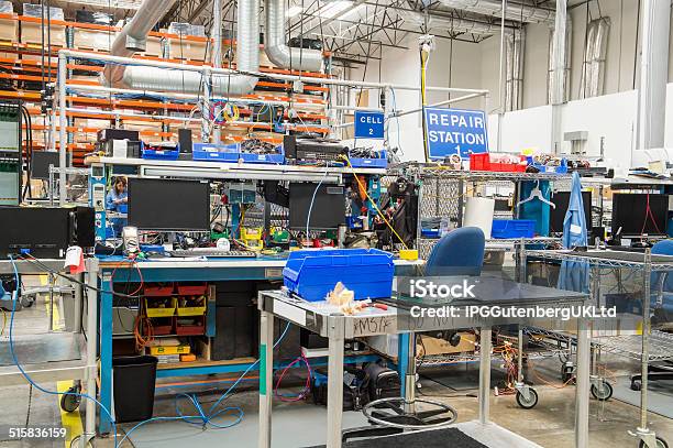 Interior Of Electronics Industry Stock Photo - Download Image Now - 30-34 Years, 30-39 Years, 35-39 Years