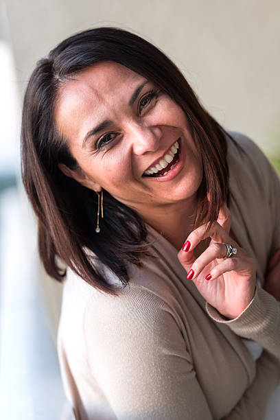 istock Smiling mature hispanic woman 515837816