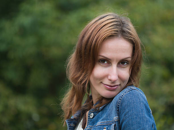 istock Young woman smiling 515837843