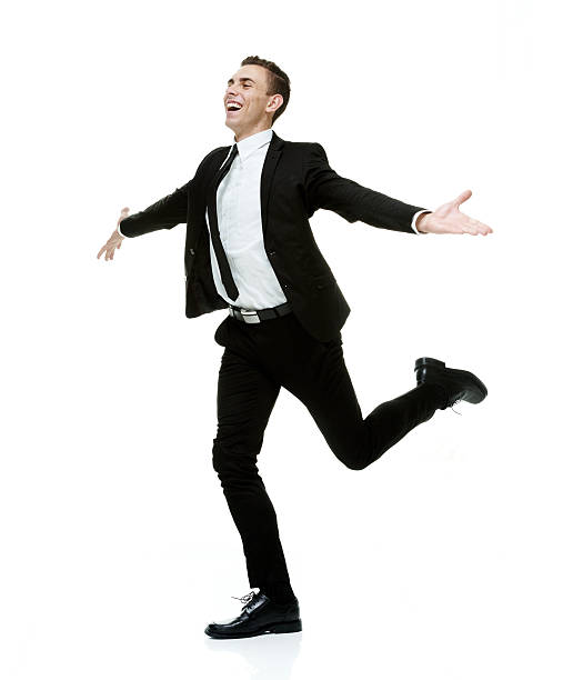 istock Cheerful businessman running with carefree attitude 515838545