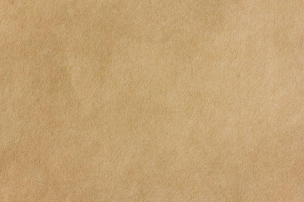 Seamless yellow Kraft Paper, background Seamless yellow Kraft Paper, background kraft paper stock pictures, royalty-free photos & images