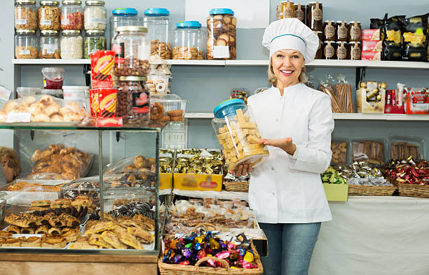 istock Women selling nuts and pastry 515851238