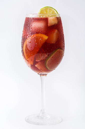 Spanish sangria with fruit and ice. Isolated photo