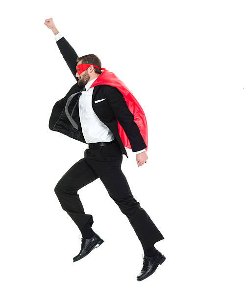 istock Businessman acting like superhero 515854580