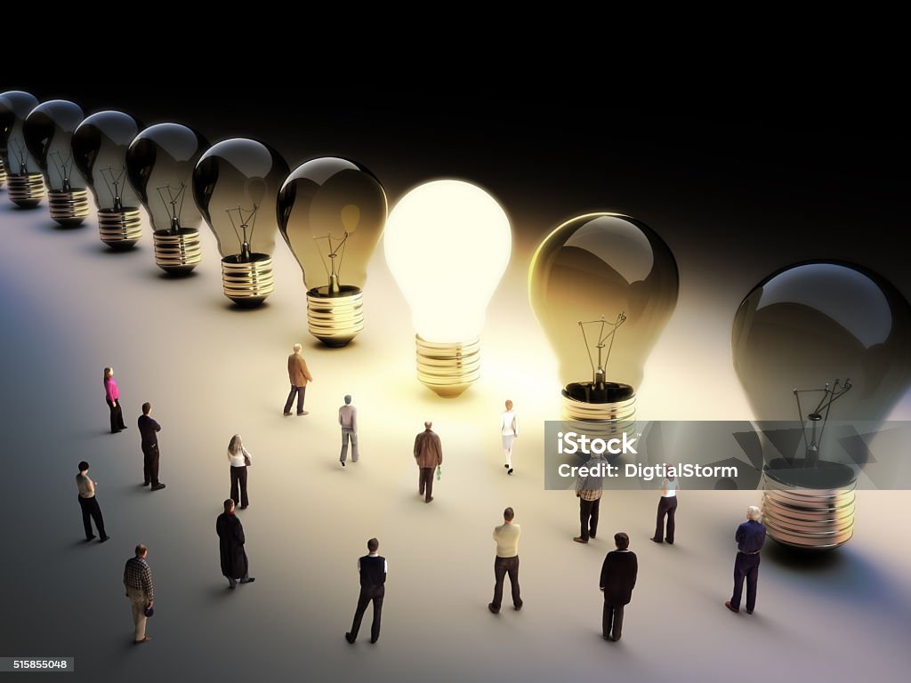 Leading the pack, ingenuity,standing out from the crowd concept. Light bulbs in a row with one being on, large group of people with a few moving to the light. Skill Stock Photo