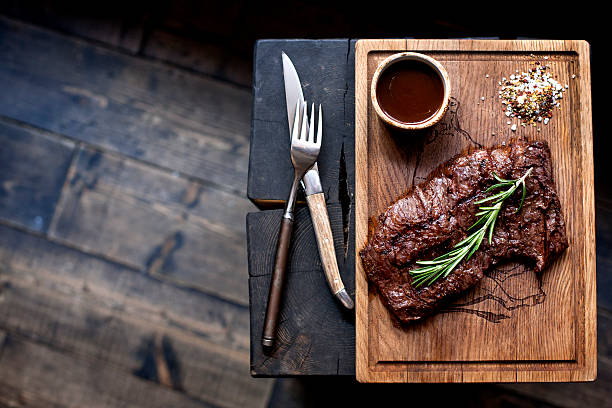 istock Beef steak. Piece of Grilled BBQ beef  in spices 515857962
