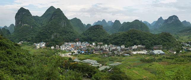 Karst mountains and fields from Moon hill near Yangshuo, Guangxi province, China