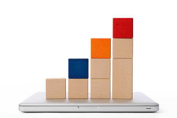 istock Isolated shot of laptop with bar chart on white background 515862857