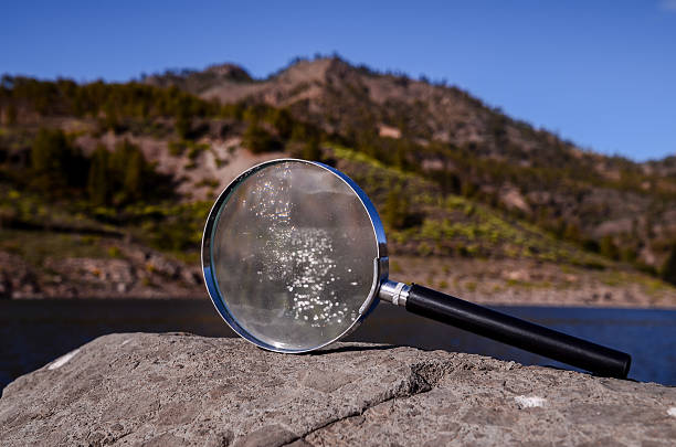 istock Magnify Glass Loupe on the Volcanic Rock 515863930