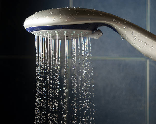 istock Shower head with stream of small water drops 515864386