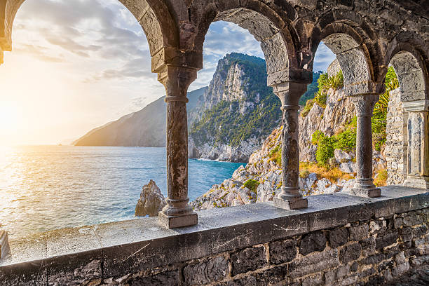 Church of St. Peter in Porto Venere, La Spezia, Italy Columns of famous gothic Church of St. Peter (Chiesa di San Pietro) with beautiful shoreline scenery at sunset in the town of Porto Venere, Ligurian Coast, province of La Spezia, Italy. liguria photos stock pictures, royalty-free photos & images