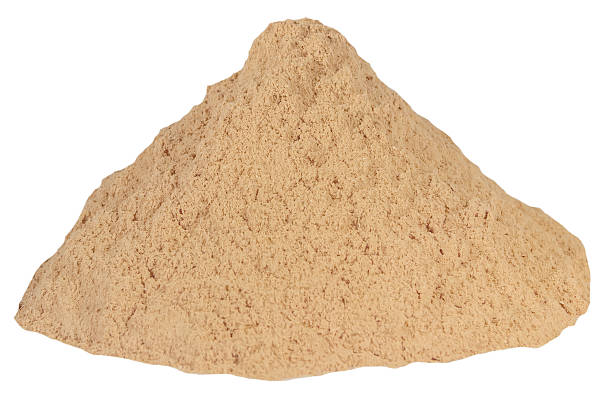 istock Small sawdust pile brown isolated white background 515881934