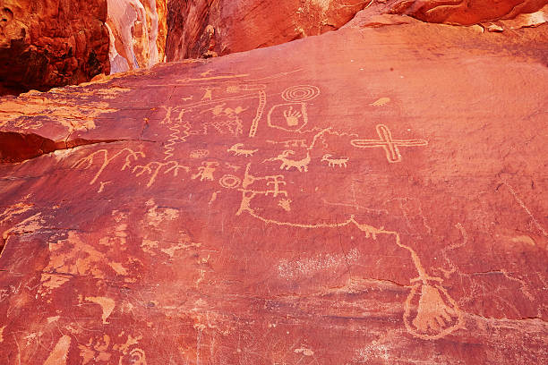 istock Petroglyphs on a rock in the Valley of the Fire 515885658