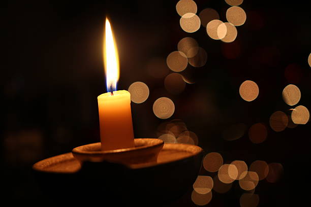 istock Candle with lights bokeh on the night 515886840