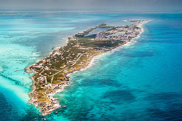 Women's Island Aerial view of Isla Mujeres and island very close to Cancun. Caribbean waters. isla mujeres stock pictures, royalty-free photos & images