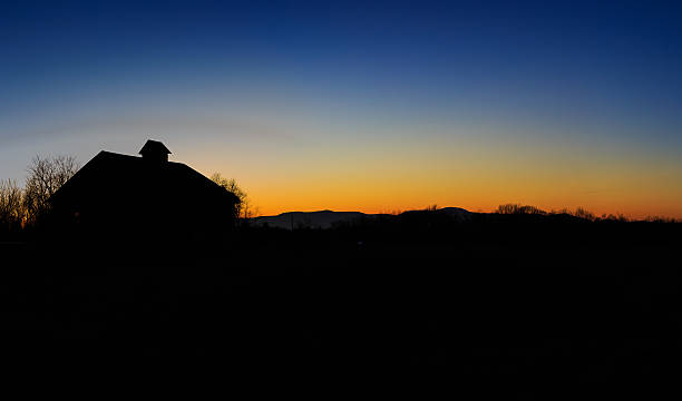 istock Sunset Silhouette Barn and Catskill Mountains 515891500
