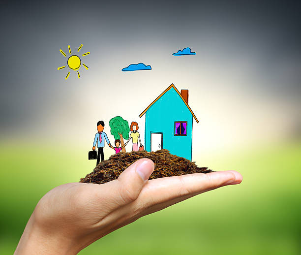 istock Business man house in  hands 515894944