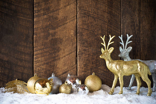 istock christmas baubles on wood wall 515896498
