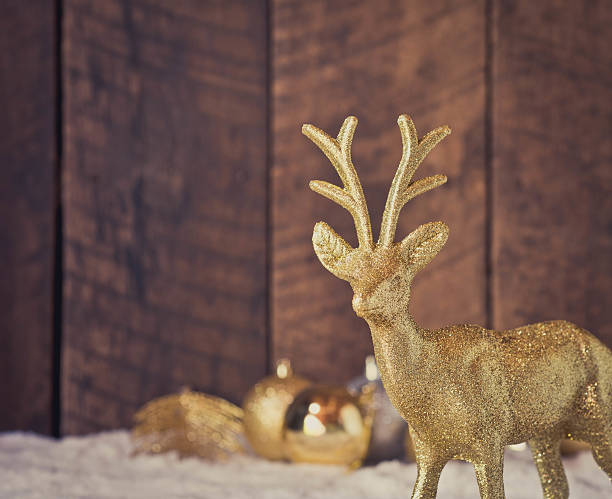 istock christmas baubles on wood wall 515896598