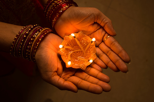 Diwali lamp on hand