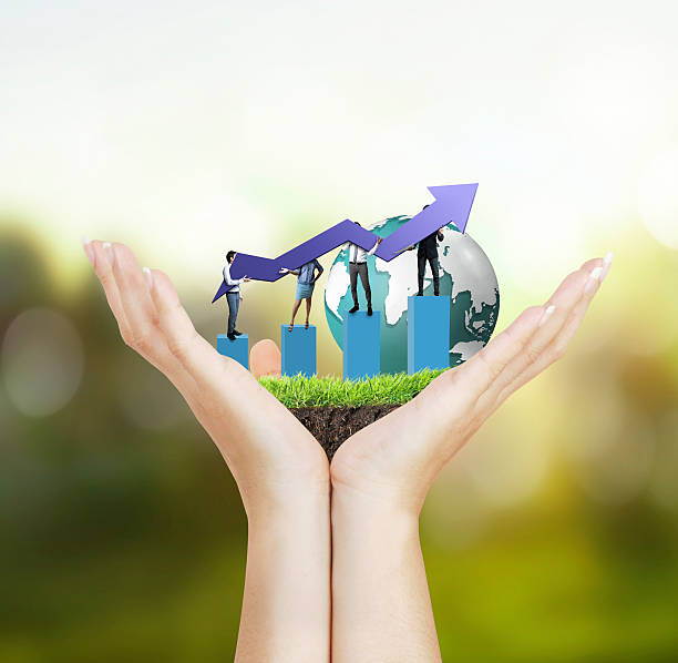 istock financial symbols coming from hand 515912446