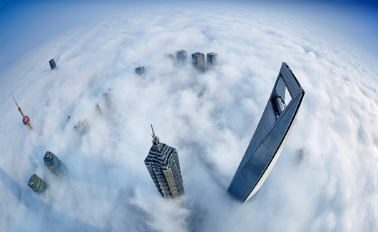 Shanghai skyline in the sea of clouds.