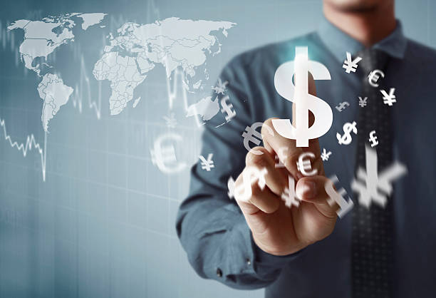 istock Businessman with financial symbols coming 515913178