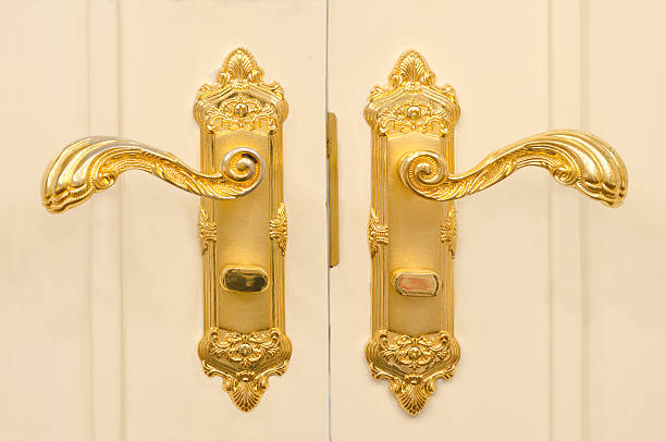 antique gold plated door handle stock photo