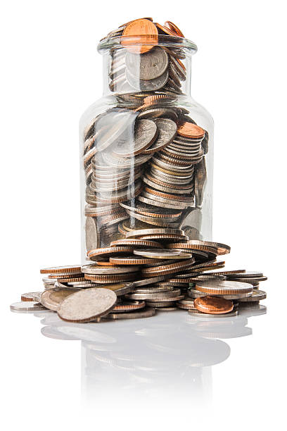 istock Glass jars with coins, savings concept 515919934