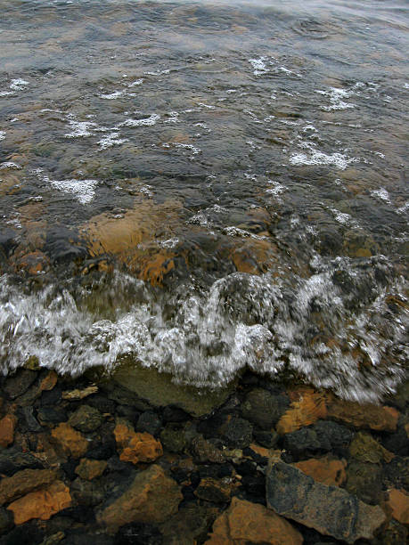 istock the stone coast of the lake 515922362