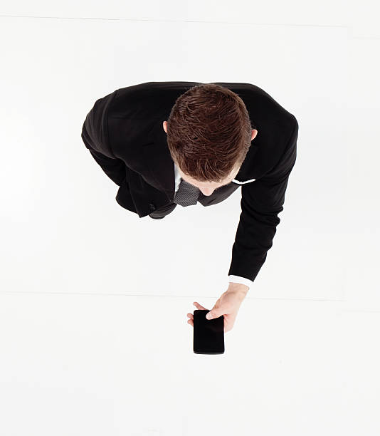 istock Above view of businessman using phone 515922538