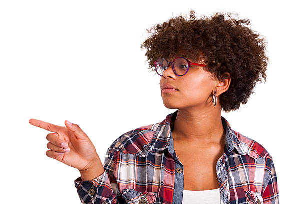 istock girl pointing a finger isolated on white 515922952