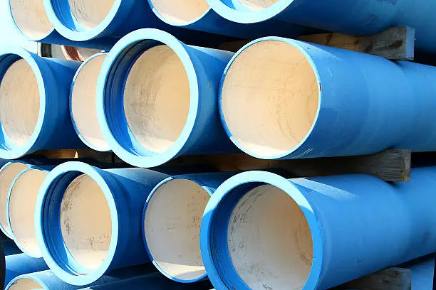 huge blue tubes for waterworks and sewer system of the city