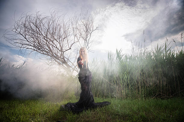 istock Weird woman in the morning mist 515924412
