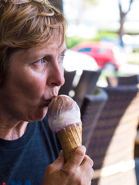 istock Woman having Ice Cream in open air restaurant 515924440