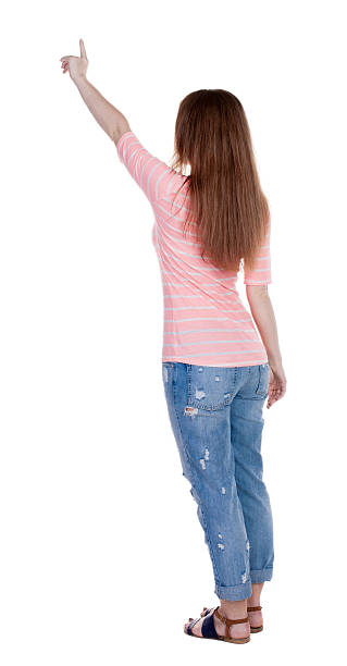 istock Back view of  pointing woman. 515925125