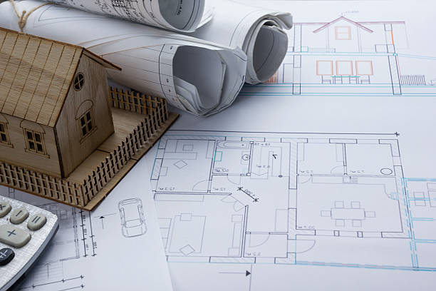 istock Real Estate concept. Architect workplace. Architectural project, blueprints, blueprint rolls 515925526