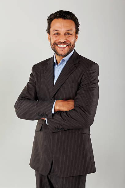 Confident business executive with his arms crossed
