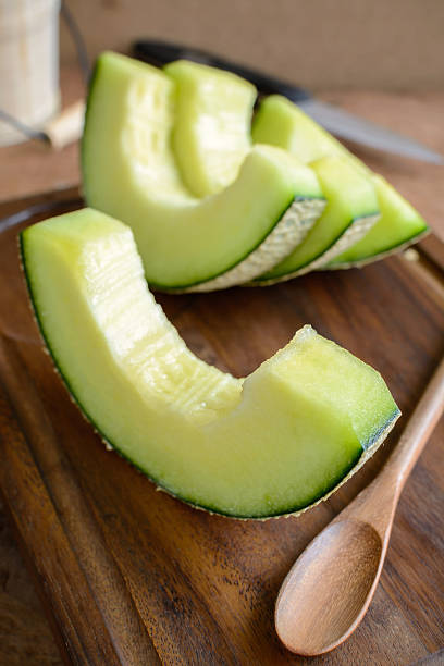 istock Juicy slice melon on a wooden table 515927504