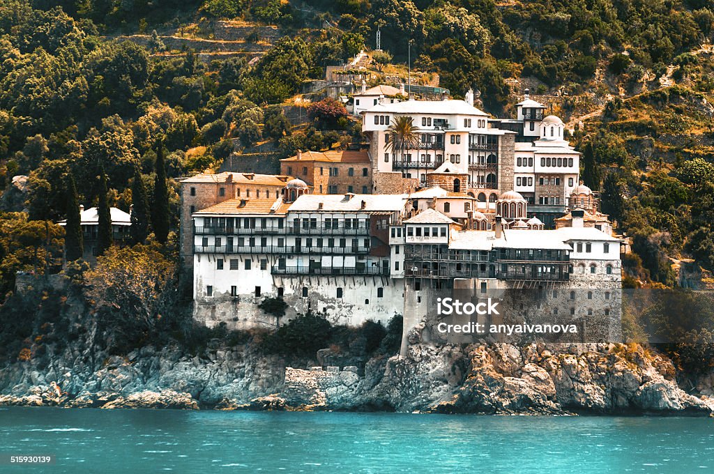 Osiou Gregoriou monastery, view from the sea Osiou Gregoriou monastery on holy mount Athos in Northern Greece, orange, Halkidiki Stock Photo