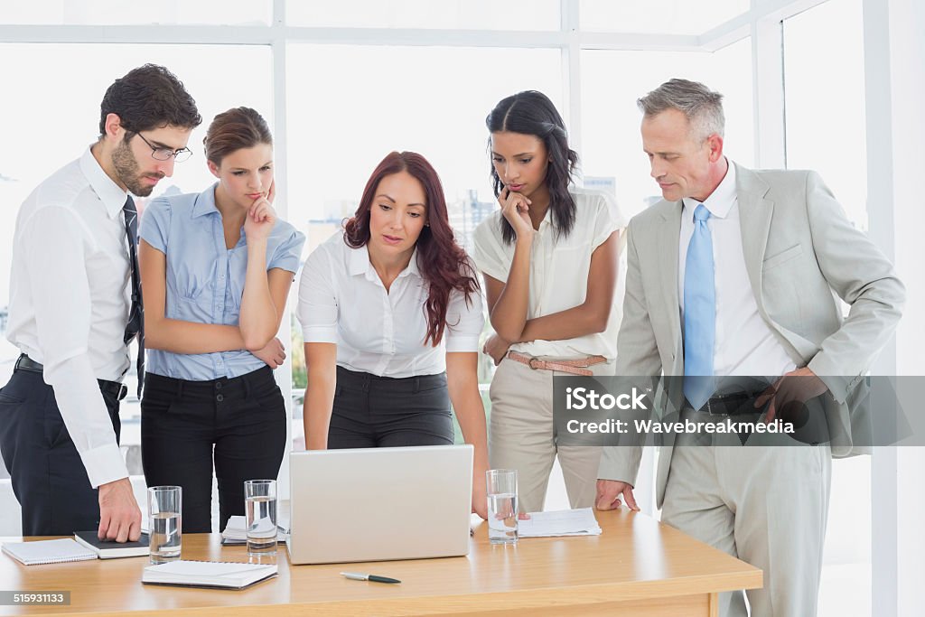 Business team discussing work details Business team discussing work details in a meeting 18-19 Years Stock Photo