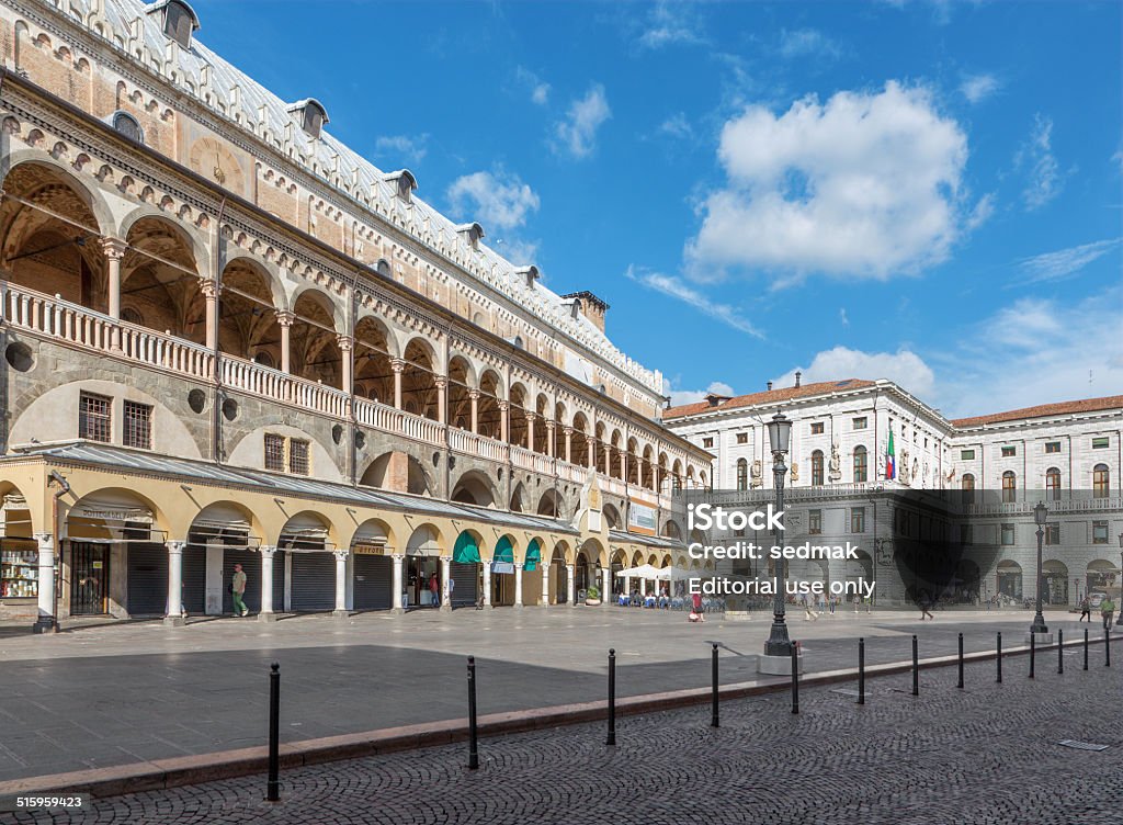 Padua - Piazza delle Erbe and Palazzo della Ragione. Padua, Italy - September 10, 2014: Piazza delle Erbe and Palazzo della Ragione with number of people on the square. Architecture Stock Photo