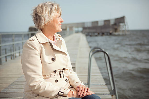 istock Senior woman by the sea. 515959627